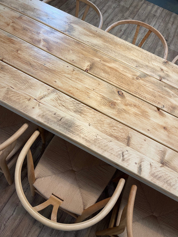Wooden Rustic dining table with wishbone chairs